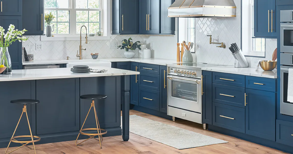 Family photographs and decorative bowls adding a personal touch to a kitchen