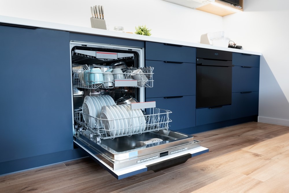 Fully integrated dishwasher in a modern Indian kitchen matching cabinetry design